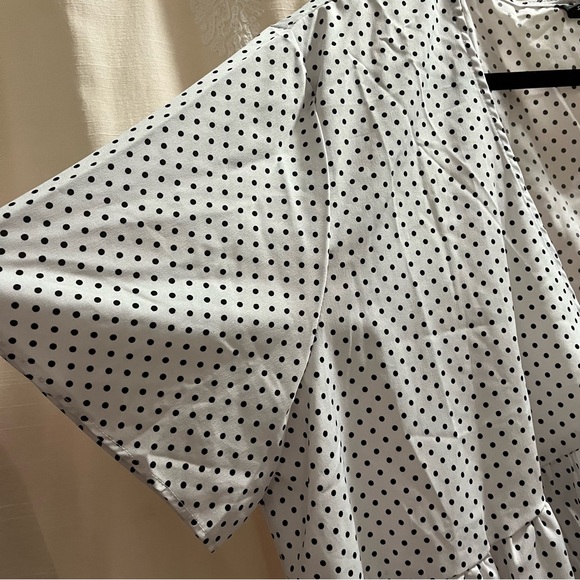 Self-Tie Black and White Polka Dot Cropped Tie-Front Peplum Top - Picture 3 of 9